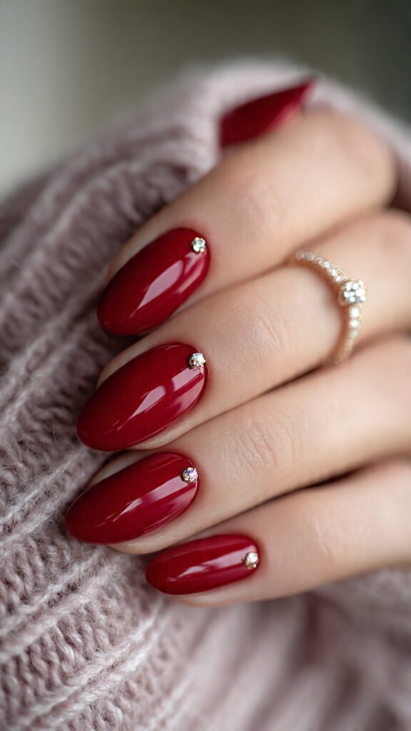 glossy-red-nails-in-coffin-shape-with-elaborate-rh