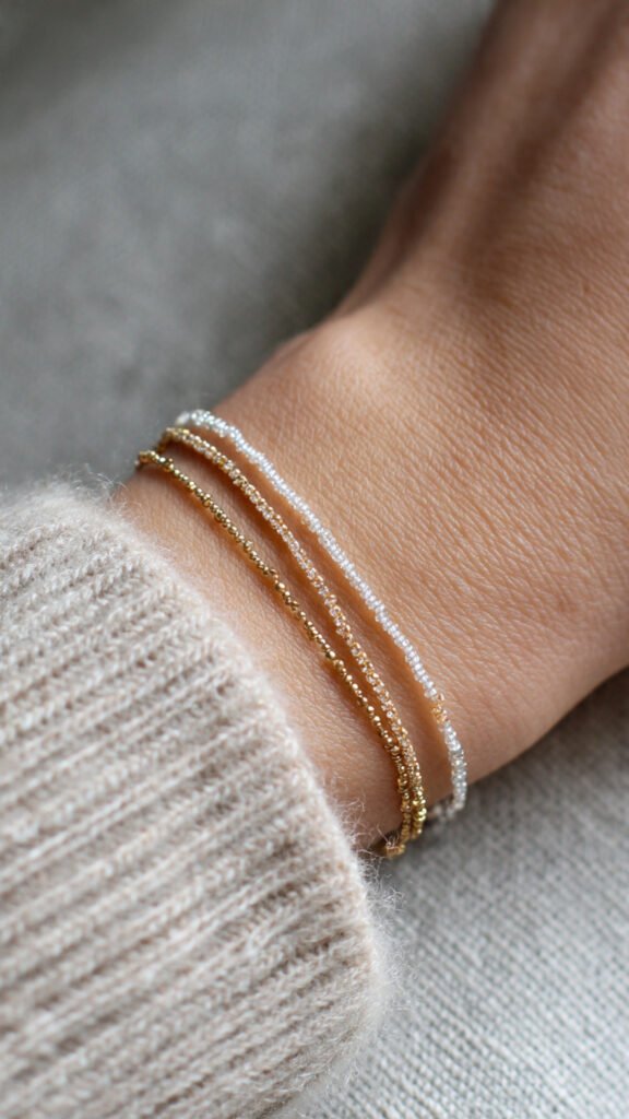 Minimalist Beaded Bracelets  Minimalist beaded bracelets represent the most accessible entry point into the category. These designs use very small beads, often in gold, silver, or neutral tones, and are intended to be subtle rather than attention-grabbing. Their real strength lies in how easily they layer with other pieces. A single minimalist bracelet may appear understated, but when combined with two or three similar designs, it creates a refined, intentional look. This style aligns with everyday wear and works across formal and casual settings, making it one of the most commercially stable segments of the market.