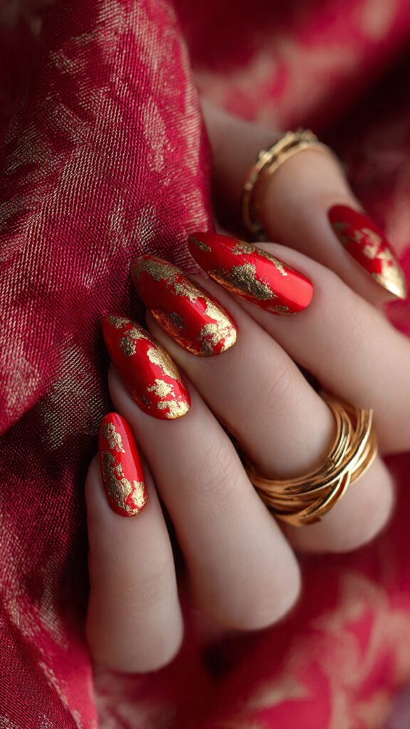 red-nails-with-gold-foil-texture-accents-imperfect (1)
