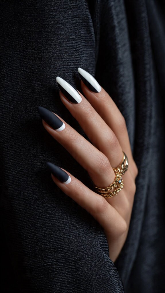 matte navy base paired with glossy white accents nail art