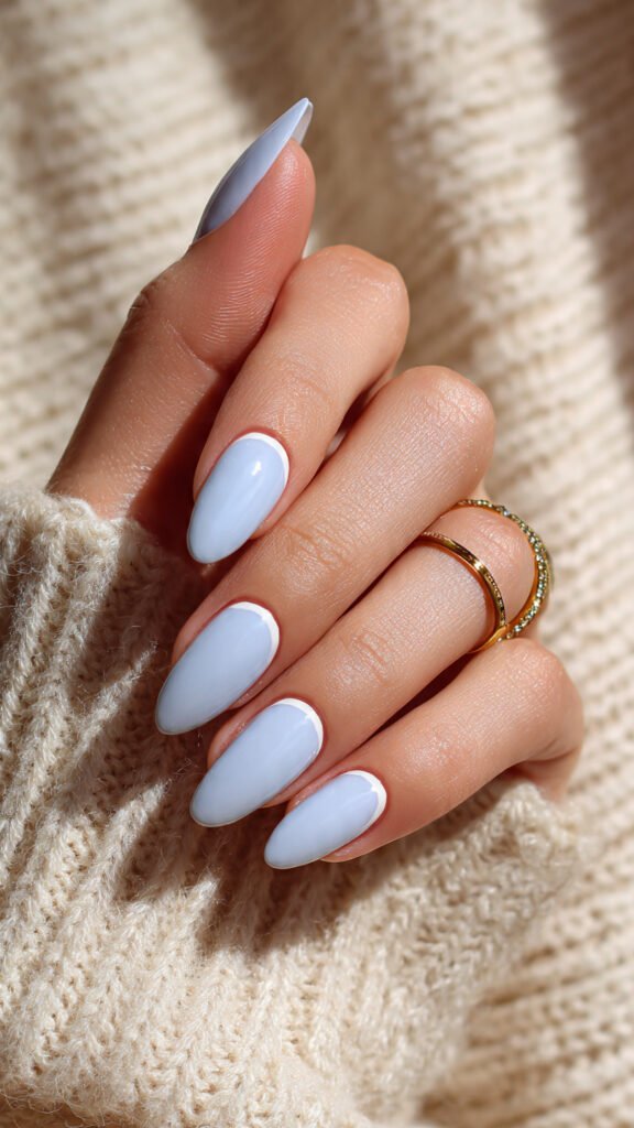 classic baby blue base with subtle white tip nail art