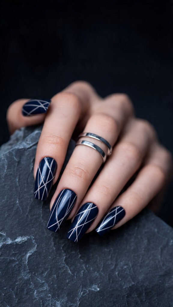 navy blue and white geometric contrast nails