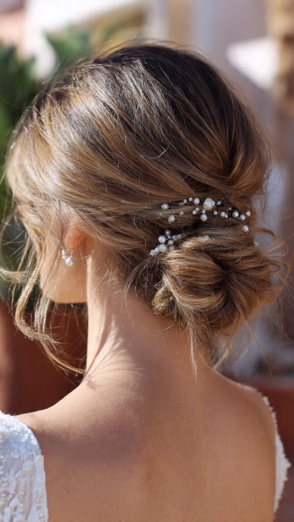 low-textured-bun-hairstyle-for-prom