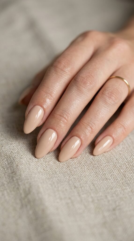 Almond-shaped_nude_nails Almond-shaped_nude_nails
