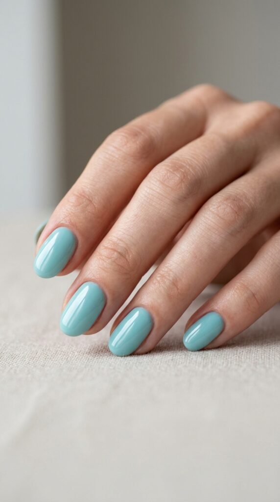 Feminine_hand_Tiffany_teal_nails Feminine_hand_Tiffany_teal_nails