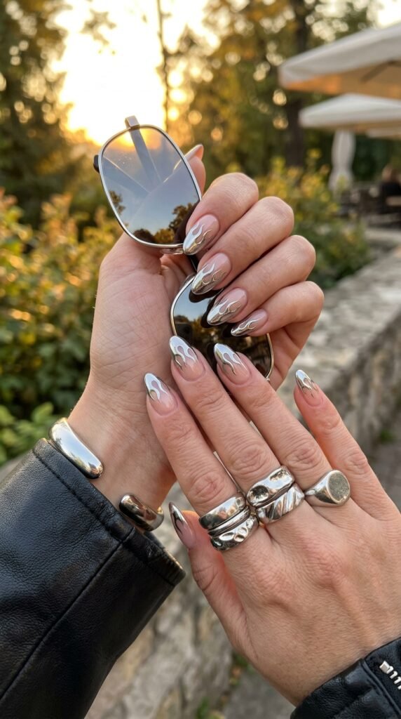 Feminine_hands_chrome_flame_nails Feminine_hands_chrome_flame_nails