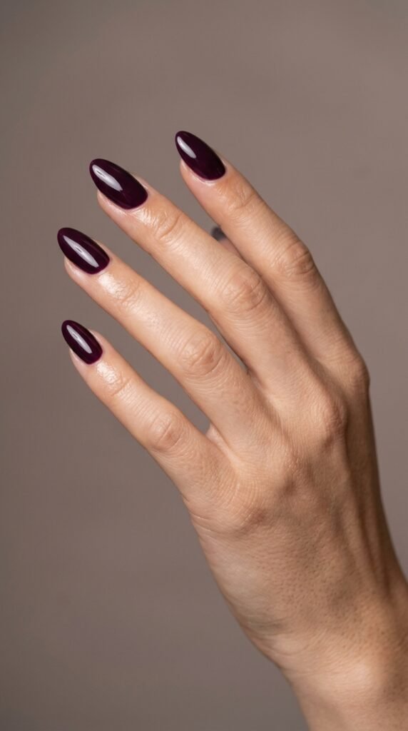 Deep_plum_almond_nails_manicure october nail designs 2026